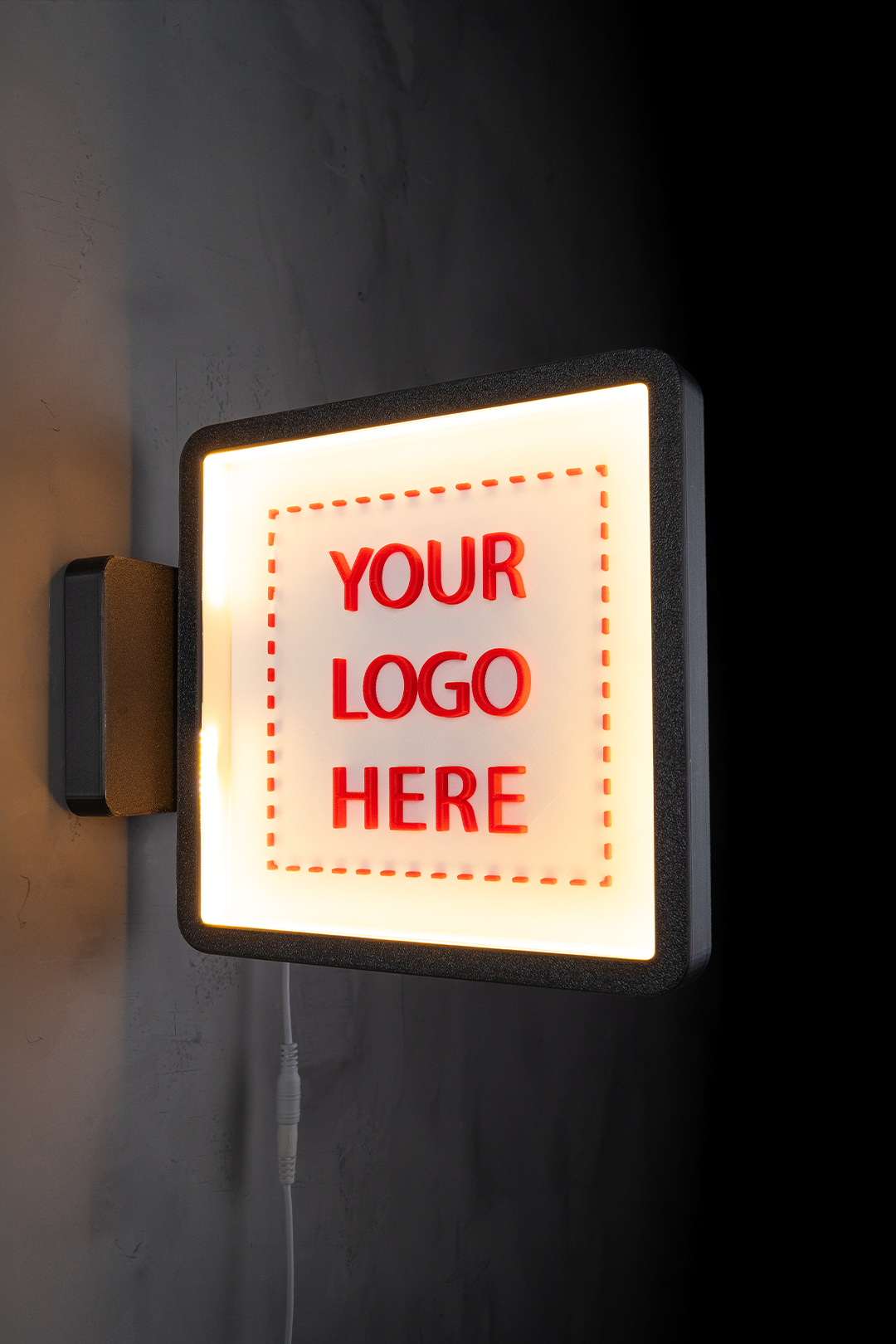 Custom Lighted Sign with Logo displayed on a wall with illuminated text 'YOUR LOGO HERE'.