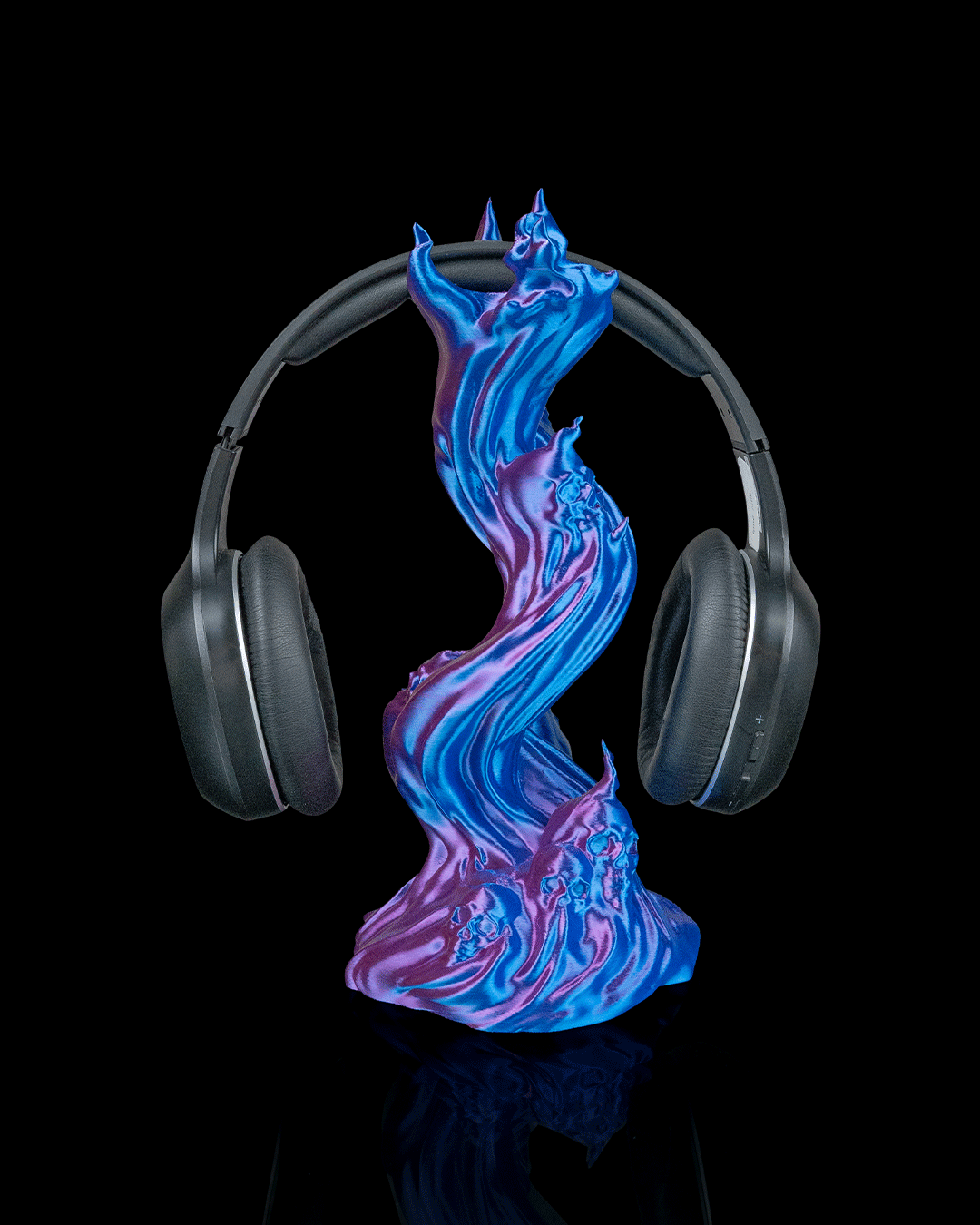 Skullflame Headphone Holder with swirling arcane design and headphones, perfect for stylishly displaying your gaming gear.