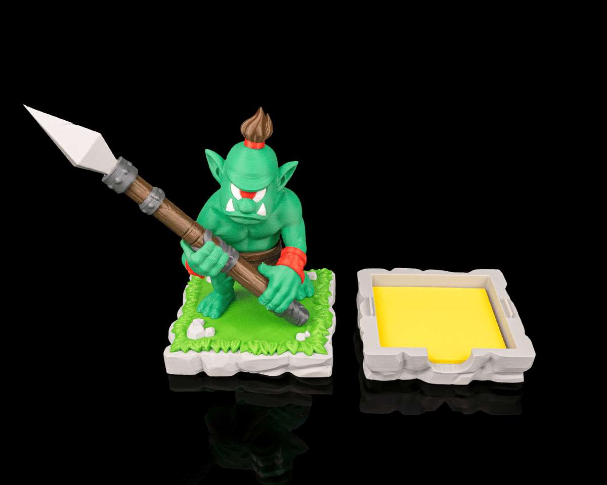 WORCaholic Pen Holder image featuring a green orc holding a spear with a yellow sticky notes holder.